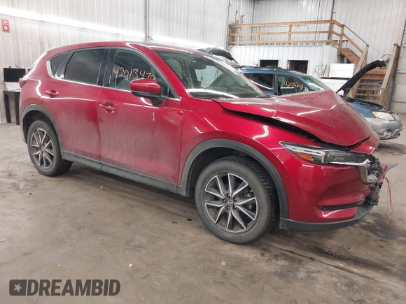 2018 Mazda CX-5 Grand Touring with VIN JM3KFBDM5J0414013, listed as a IAAI auction lot 42013479 with 88,225 mi miles and . Bid and sale history available at DreamBid. Image 1.