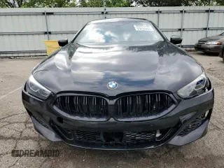 2022 BMW 8 Series M850i z VIN WBAGV8C02NCK08667, wystawiony jako Copart lot #55632805 z przebiegiem 22 737 mil mil oraz Szkody całkowita. Historia ofert i sprzedaży dostępna na DreamBid. Obrazek 5.