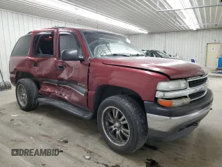 2002 Chevrolet Tahoe LS with VIN 1GNEC13T02R228644, listed as a Copart auction lot 55672545 with 245,005 mi miles and Non repairable. Bid and sale history available at DreamBid. Image 4.