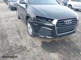 2018 Audi Q3 Premium Plus with VIN WA1JCCFS9JR033902, listed as a IAAI auction lot 41617460 with 97,771 mi miles. Bid and sale history available at carsss.com. Image 17.