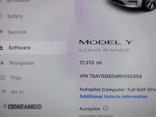 2024 Tesla Model Y with VIN 7SAYGDED4RF055859, listed as a IAAI auction lot 42201099 with 17,373 mi miles and . Bid and sale history available at DreamBid. Image 15.