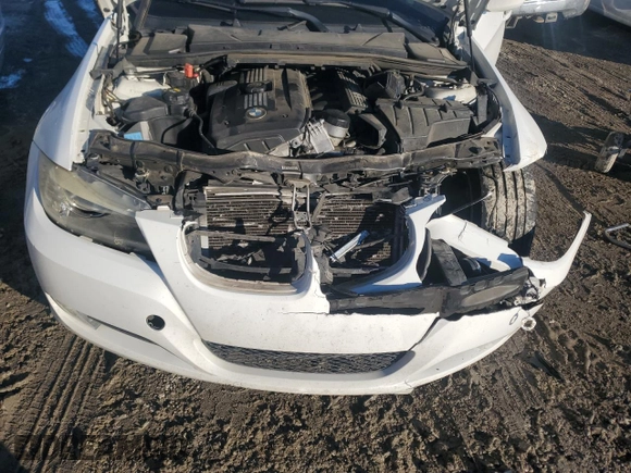 2011 BMW 3 Series 328i with VIN WBAPH7G58BNM55893, listed as a Copart auction lot 89115715 with 125,154 mi miles and Salvage Title. Bid and sale history available at carsss.com. Image 12.