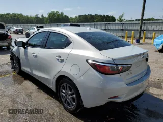 2019 Toyota Yaris L z VIN 3MYDLBYV7KY519027, wystawiony jako Copart lot #57104345 z przebiegiem Nie podano mil oraz Szkoda całkowita • Salvage title. Historia ofert i sprzedaży dostępna na DreamBid. Obrazek 2.