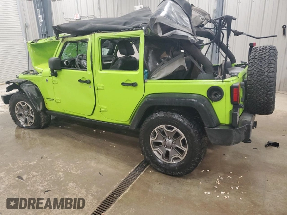 2013 Jeep Wrangler Unlimited Rubicon 10th Anniversary z VIN 1C4HJWFGXDL526535, wystawiony jako Copart lot #85209824 z przebiegiem Nie podano mil oraz Szkoda całkowita • Salvage title. Historia ofert i sprzedaży dostępna na DreamBid. Obrazek 2.
