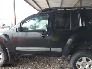 2005 Nissan Xterra S with VIN 5N1AN08W65C628712, listed as a IAAI auction lot 41464241 with 197,408 mi miles. Bid and sale history available at carsss.com. Image 14.