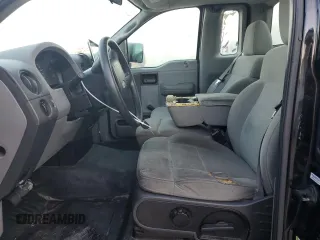 2007 Ford F-150 STX with VIN 1FTRF02297KD15057, listed as a Copart auction lot 73847974 with 184,413 mi miles and Salvage Title. Bid and sale history available at carsss.com. Image 7.