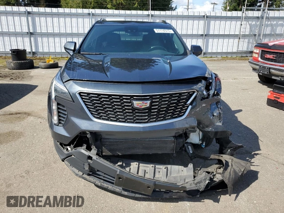 2021 Cadillac XT4 AWD Luxury with VIN 1GYFZBR48MF034573, listed as a Copart auction lot 51114315 with 53,066 mi miles and Salvage title. Bid and sale history available at DreamBid. Image 5.