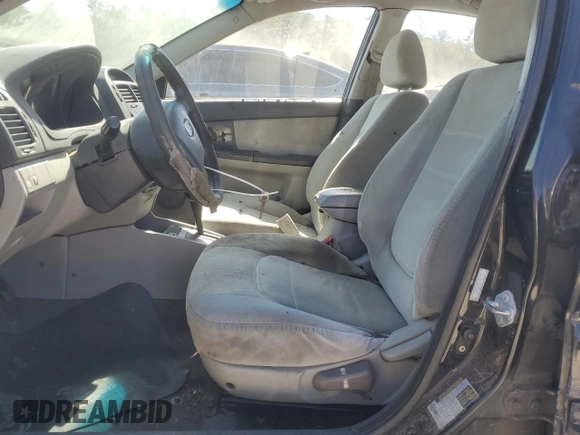 2009 Kia Spectra SX with VIN KNAFE221X95614791, listed as a Copart auction lot 75534254 with 195,288 mi miles and Salvage Title. Bid and sale history available at carsss.com. Image 7.