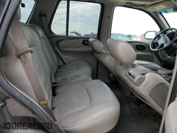 2003 Oldsmobile Bravada z VIN 1GHDS13S532114304, wystawiony jako Copart lot #88533455 z przebiegiem 231 181 mil mil oraz Szkoda całkowita • Salvage title. Historia ofert i sprzedaży dostępna na DreamBid. Obrazek 11.