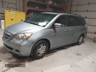 2007 Honda Odyssey EX-L with VIN 5FNRL38697B012944, listed as a IAAI auction lot 42144250 with 234,016 mi miles and . Bid and sale history available at DreamBid. Image 21.
