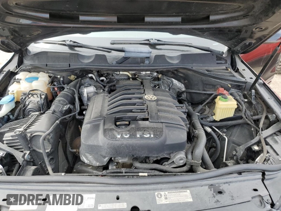 2012 Volkswagen Touareg Sport with VIN WVGFF9BP8CD001039, listed as a Copart auction lot 57764125 with 128,540 mi miles and Clean title. Bid and sale history available at DreamBid. Image 12.