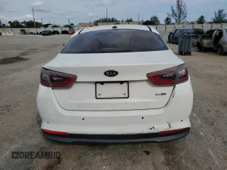 2014 Kia Optima Hybrid EX with VIN KNAGN4AD1E5073961, listed as a Copart auction lot 76757104 with 99,971 mi miles and Clean Title. Bid and sale history available at carsss.com. Image 6.