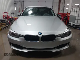 2014 BMW 3 Series 328d xDrive with VIN WBA3D5C55EF147308, listed as a IAAI auction lot 41499435 with 104,941 mi miles. Bid and sale history available at carsss.com. Image 13.