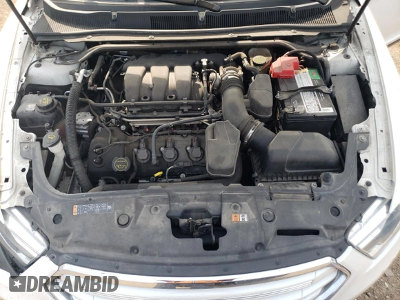 2016 Ford Taurus Limited with VIN 1FAHP2F8XGG124551, listed as a Copart auction lot 60621695 with 103,668 mi miles and Salvage title. Bid and sale history available at DreamBid. Image 11.