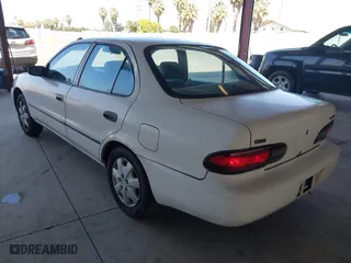 1994 Geo Prizm with VIN 1Y1SK5363RZ081192, listed as a IAAI auction lot 42081796 with 287,952 mi miles. Bid and sale history available at carsss.com. Image 3.