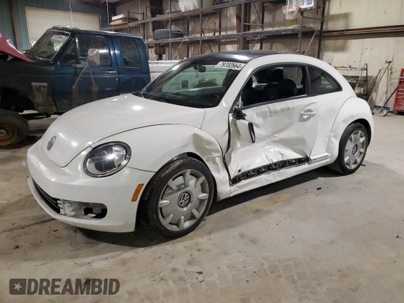 2012 Volkswagen Beetle 2.5L PZEV with VIN 3VWJP7AT3CM610930, listed as a Copart auction lot 79702664 with 0 mi miles and Salvage Title. Bid and sale history available at carsss.com. Image 1.