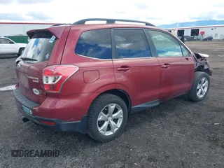 2014 Subaru Forester 2.5i Limited with VIN JF2SJAHC9EH470628, listed as a IAAI auction lot 41990856 with 135,869 mi miles. Bid and sale history available at carsss.com. Image 4.