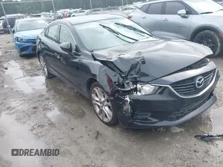 2015 Mazda 6 i Touring with VIN JM1GJ1V55F1223045, listed as a IAAI auction lot 42412516 with 159,716 mi miles and . Bid and sale history available at DreamBid. Image 1.