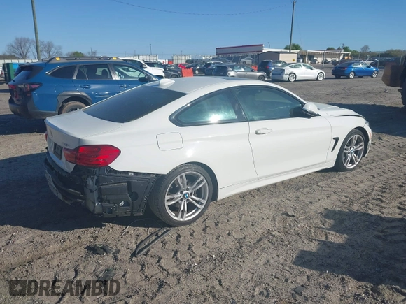 2014 BMW 4 Series 428i with VIN WBA3N3C53EF712057, listed as a IAAI auction lot 41868781 with 133,834 mi miles and . Bid and sale history available at DreamBid. Image 4.