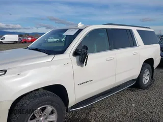 2015 GMC Yukon XL SLT with VIN 1GKS2HKC3FR586338, listed as a IAAI auction lot 41632662 with 149,133 mi miles. Bid and sale history available at carsss.com. Image 17.