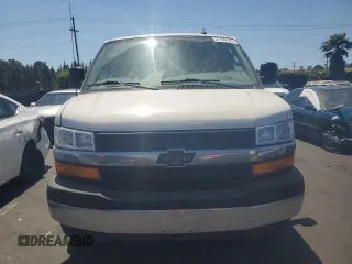 2019 Chevrolet Express Passenger LT with VIN 1GAZGPFG4K1252856, listed as a Copart auction lot 57459135 with 159,676 mi miles and Salvage title. Bid and sale history available at DreamBid. Image 5.