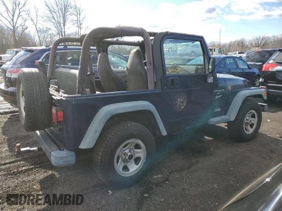 2000 Jeep Wrangler Sport with VIN 1J4FA49S2YP803165, listed as a Copart auction lot 85611904 with 192,427 mi miles and Non repairable. Bid and sale history available at DreamBid. Image 3.