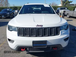2017 Jeep Grand Cherokee Trailhawk with VIN 1C4RJFLGXHC959092, listed as a IAAI auction lot 41232281 with 108,659 mi miles and . Bid and sale history available at DreamBid. Image 12.
