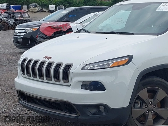 2016 Jeep Cherokee Latitude z VIN 1C4PJMCS4GW332918, wystawiony jako IAAI lot #42447507 z przebiegiem 97 575 mil mil oraz . Historia ofert i sprzedaży dostępna na DreamBid. Obrazek 12.
