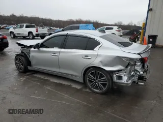 2014 Infiniti Q50 Sport with VIN JN1BV7AR7EM689473, listed as a Copart auction lot 52858085 with 99,395 mi miles and Salvage title. Bid and sale history available at DreamBid. Image 2.