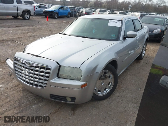 2005 Chrysler 300 with VIN 2C3JA53G85H159623, listed as a IAAI auction lot 41773424 with 127,764 mi miles. Bid and sale history available at carsss.com. Image 2.