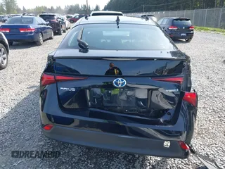2021 Toyota Prius L Eco with VIN JTDKAMFU8M3136565, listed as a IAAI auction lot 42161896 with 39,634 mi miles and . Bid and sale history available at DreamBid. Image 17.