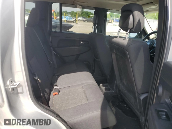 2011 Jeep Liberty Sport with VIN 1J4PN2GK7BW585608, listed as a Copart auction lot 61379875 with 144,904 mi miles and Salvage title. Bid and sale history available at DreamBid. Image 11.