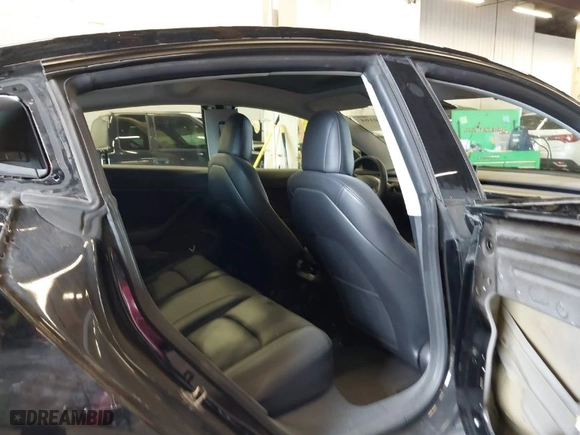 2023 Tesla Model 3 with VIN 5YJ3E1EA1PF458888, listed as a IAAI auction lot 41730104 with 82,995 mi miles. Bid and sale history available at carsss.com. Image 8.