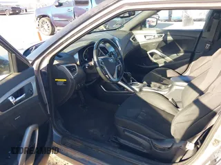 2017 Hyundai Veloster with VIN KMHTC6AD9HU323472, listed as a IAAI auction lot 41865974 with 94,692 mi miles. Bid and sale history available at carsss.com. Image 5.