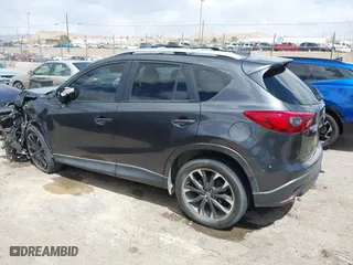 2016 Mazda CX-5 Grand Touring with VIN JM3KE4DY7G0643643, listed as a IAAI auction lot 42077497 with 120,343 mi miles. Bid and sale history available at carsss.com. Image 14.