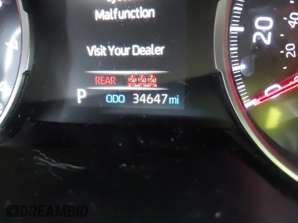 2020 Toyota RAV4 XLE with VIN JTMW1RFV0LD521893, listed as a IAAI auction lot 42701228 with 34,647 mi miles and . Bid and sale history available at DreamBid. Image 16.