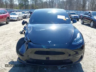 2021 Tesla Model Y Performance with VIN 5YJYGDEF6MF252877, listed as a IAAI auction lot 41770770 with 58,550 mi miles and . Bid and sale history available at DreamBid. Image 12.
