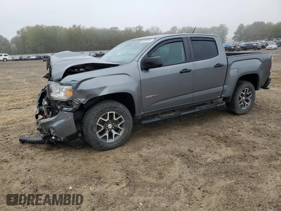 2021 GMC Canyon 4WD AT4 w/Cloth with VIN 1GTG6FEN8M1115918, listed as a Copart auction lot 80592964 with 59,888 mi miles and Salvage Title. Bid and sale history available at carsss.com. Image 1.
