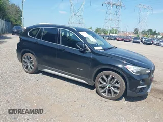 2017 BMW X1 xDrive28i with VIN WBXHT3C3XH5F82629, listed as a IAAI auction lot 42578762 with 89,744 mi miles and . Bid and sale history available at DreamBid. Image 1.