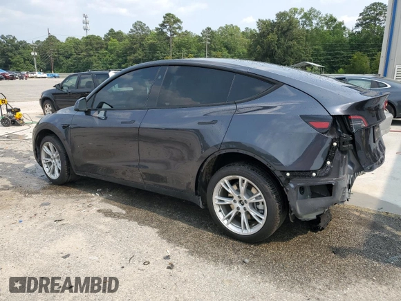 2024 Tesla Model Y Long Range with VIN 7SAYGDEE0RA255613, listed as a Copart auction lot 58993085 with 39,336 mi miles and Salvage title. Bid and sale history available at DreamBid. Image 2.