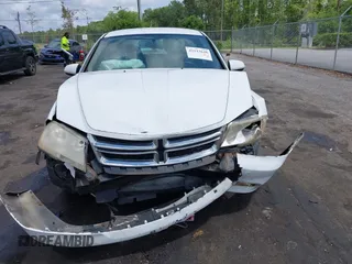 2012 Dodge Avenger SXT with VIN 1C3CDZCB5CN156288, listed as a IAAI auction lot 42115638 with 157,534 mi miles and . Bid and sale history available at DreamBid. Image 12.