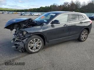 2021 BMW X2 xDrive28i with VIN WBXYJ1C06M5S80214, listed as a Copart auction lot 67921564 with 45,056 mi miles and Salvage Title. Bid and sale history available at carsss.com. Image 1.