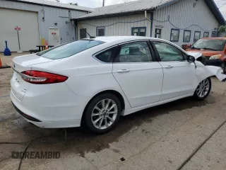 2017 Ford Fusion SE with VIN 3FA6P0HD1HR115897, listed as a Copart auction lot 61087315 with 124,311 mi miles and Salvage title. Bid and sale history available at DreamBid. Image 3.