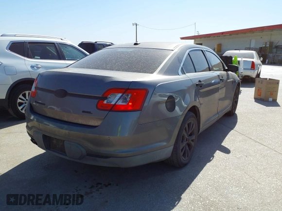 2011 Ford Taurus SEL with VIN 1FAHP2EW4BG183541, listed as a IAAI auction lot 41832302 with 185,085 mi miles. Bid and sale history available at carsss.com. Image 4.