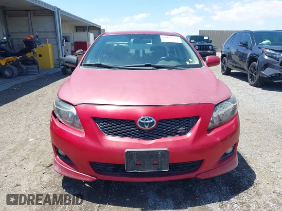 2009 Toyota Corolla with VIN 1NXBU40EX9Z077847, listed as a IAAI auction lot 42188763 with 180,324 mi miles. Bid and sale history available at carsss.com. Image 6.
