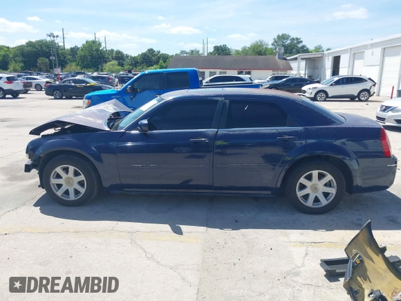 2005 Chrysler 300 with VIN 2C3JA53G25H167944, listed as a IAAI auction lot 41963114 with 196,635 mi miles. Bid and sale history available at carsss.com. Image 15.