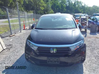 2021 Honda Odyssey Touring with VIN 5FNRL6H84MB027396, listed as a IAAI auction lot 42616650 with 67,207 mi miles and . Bid and sale history available at DreamBid. Image 12.