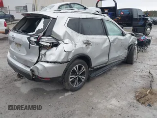2017 Nissan Rogue SV with VIN JN8AT2MT7HW143178, listed as a IAAI auction lot 41015343 with 139,828 mi miles and . Bid and sale history available at DreamBid. Image 4.