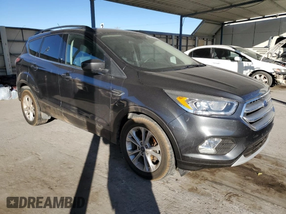 2017 Ford Escape SE with VIN 1FMCU0GD5HUF05252, listed as a Copart auction lot 83610274 with 100,481 mi miles and Clean Title. Bid and sale history available at carsss.com. Image 4.