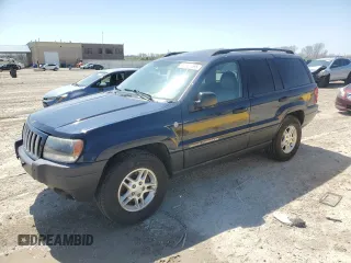 2004 Jeep Grand Cherokee Laredo with VIN 1J4GW48N64C404696, listed as a Copart auction lot 52352465 with 145,283 mi miles and Salvage title. Bid and sale history available at DreamBid. Image 1.